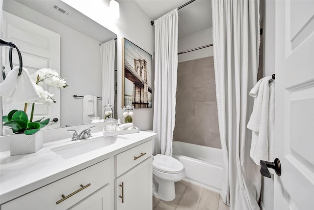 full bathroom with shower / bath combination with curtain, vanity, and toilet