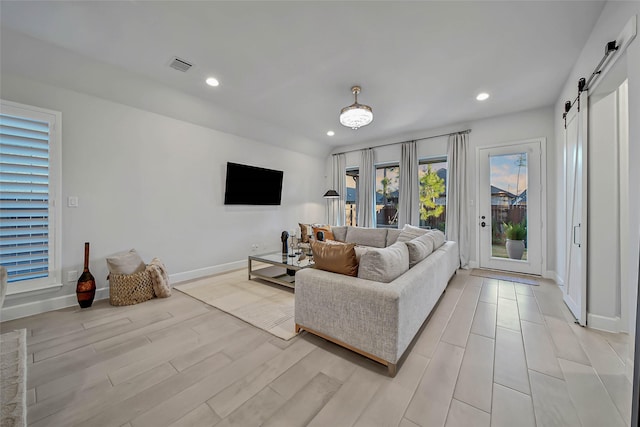 living room with a barn door