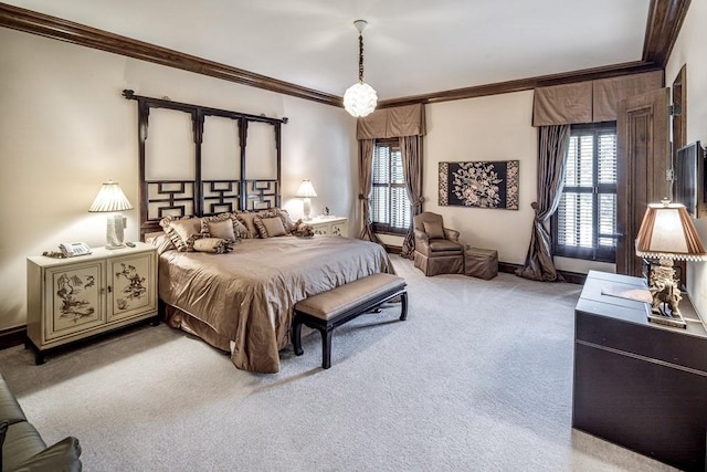 carpeted bedroom featuring ornamental molding