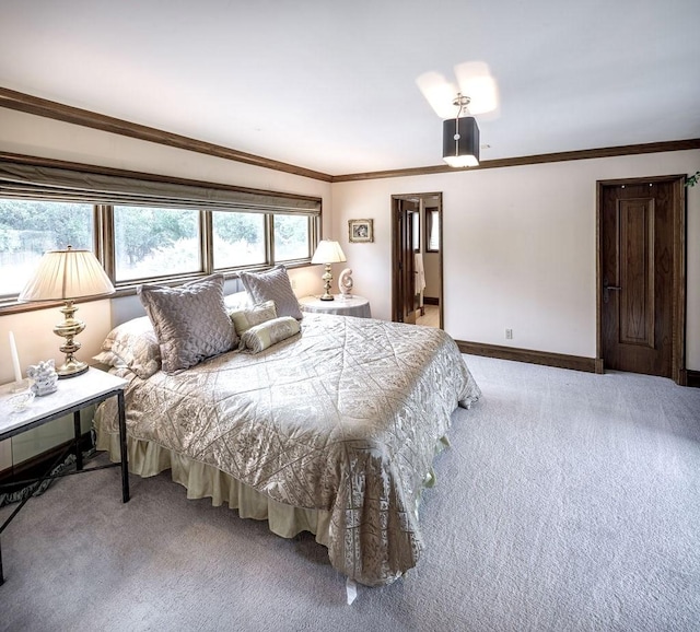 bedroom with carpet and ornamental molding