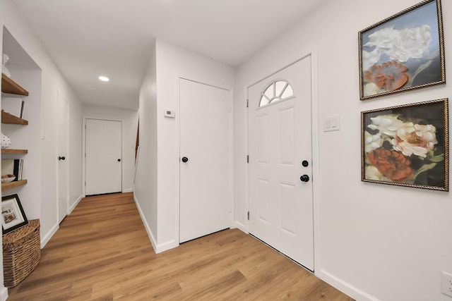 foyer entrance featuring light hardwood / wood-style flooring