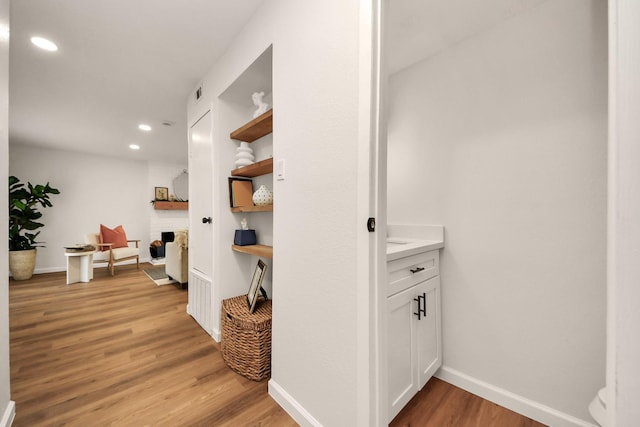 hallway featuring light hardwood / wood-style floors