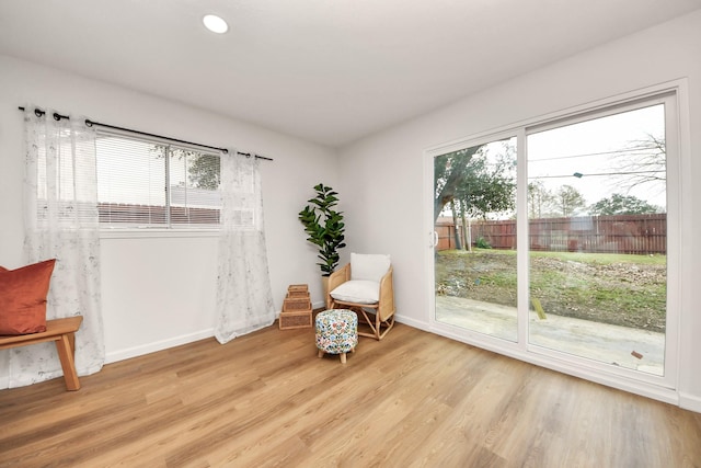 sitting room featuring light wood-type flooring