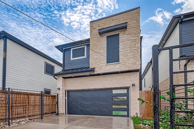 view of front of property featuring a garage