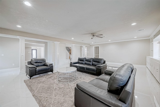 living room with ceiling fan, crown molding, and a textured ceiling