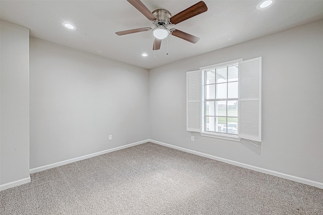 empty room with carpet flooring and ceiling fan