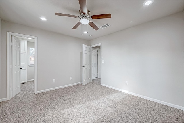 unfurnished bedroom featuring carpet floors and ceiling fan