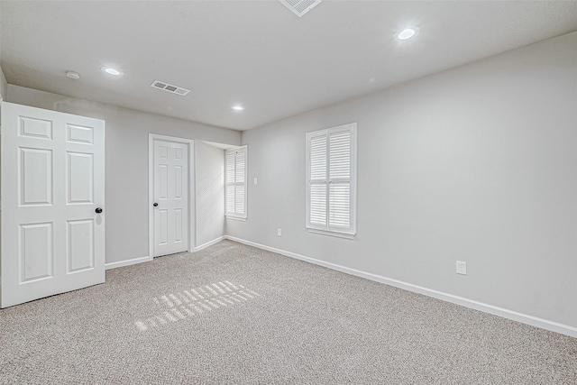 unfurnished bedroom featuring carpet