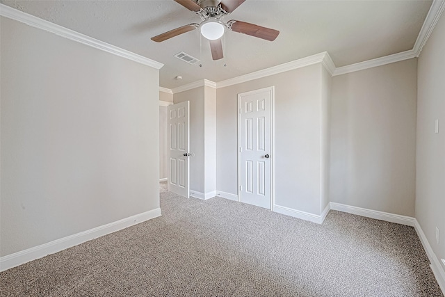 unfurnished bedroom featuring carpet flooring, a closet, ceiling fan, and ornamental molding