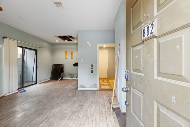 entrance foyer featuring hardwood / wood-style floors