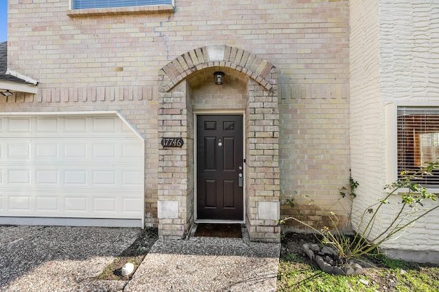 property entrance featuring a garage