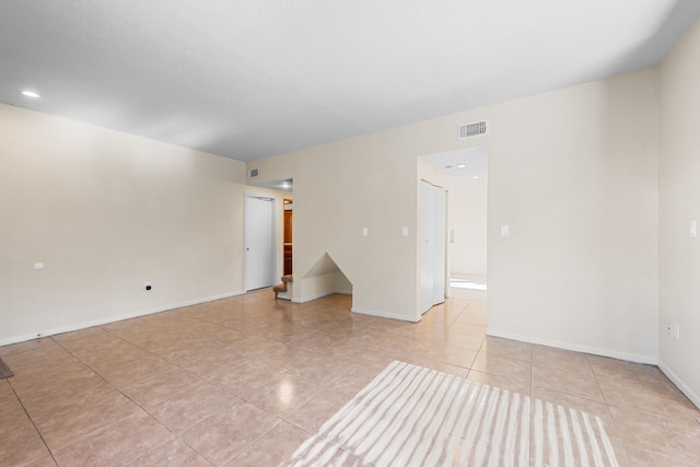 view of tiled spare room