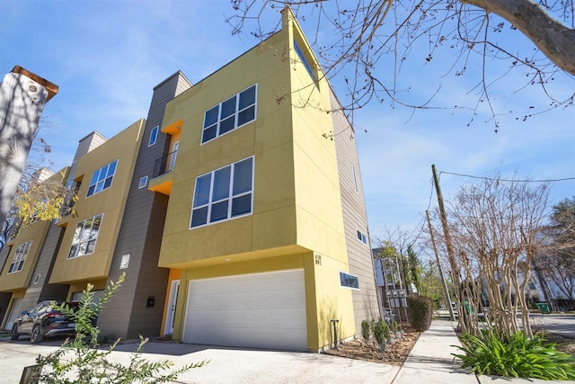 view of building exterior with a garage