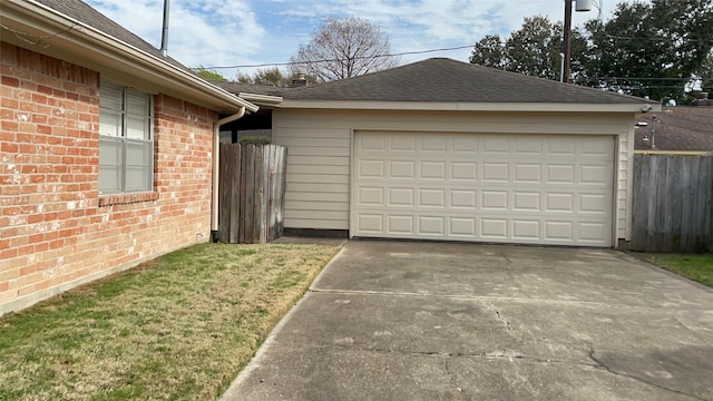 garage with a lawn