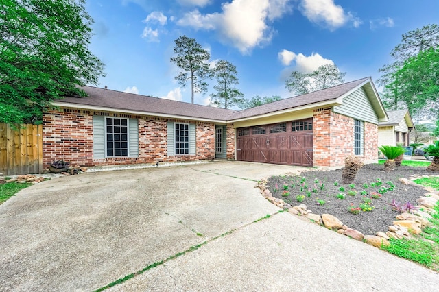 single story home featuring a garage