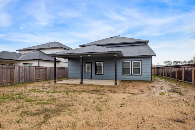 back of property featuring a patio area