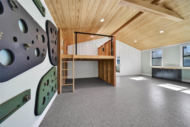 interior space featuring vaulted ceiling with beams, wood walls, and wood ceiling