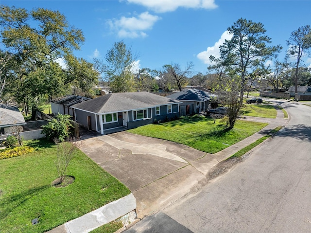 single story home with a front lawn