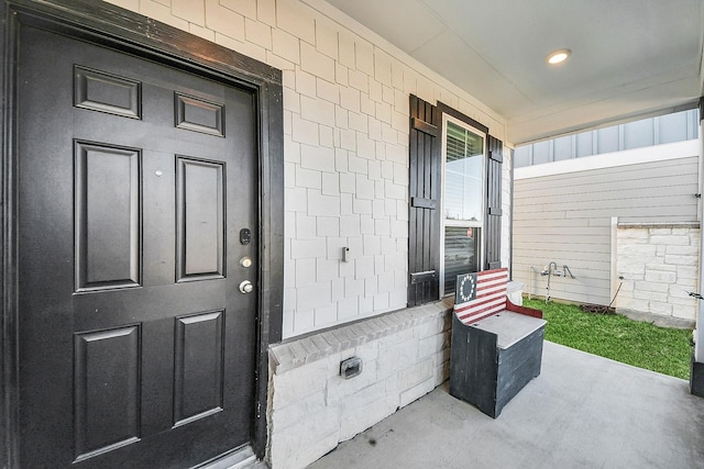 entrance to property with a porch