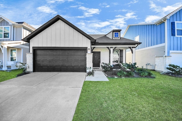 view of front of house featuring a front lawn, a porch, and a garage