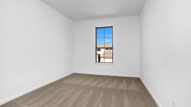 4726 Joplin St, Manvel, TX 77583 - carpeted empty room featuring baseboards