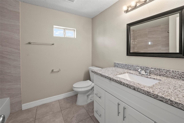 bathroom with toilet, a textured ceiling, vanity, and tile patterned floors