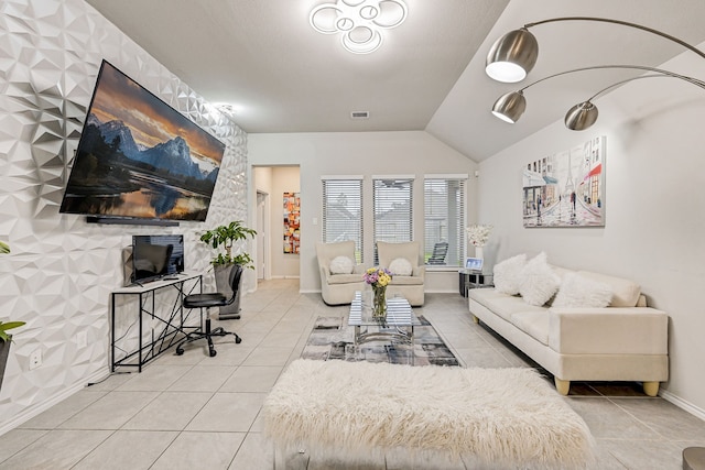 living room with lofted ceiling and tile patterned floors