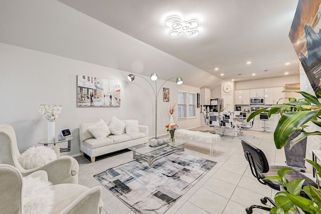 tiled living room featuring vaulted ceiling