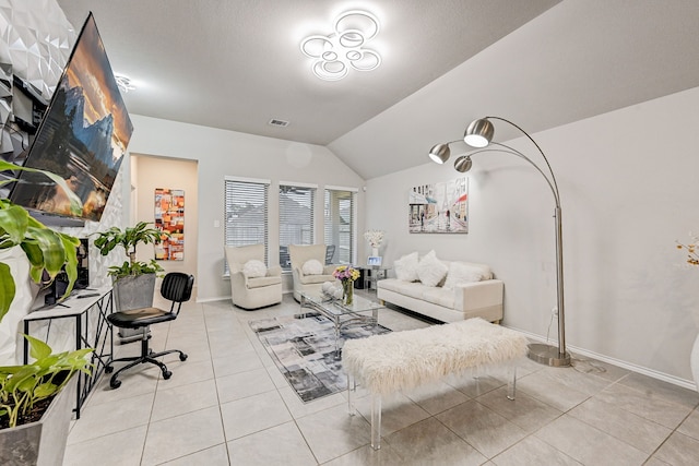 tiled living room featuring lofted ceiling