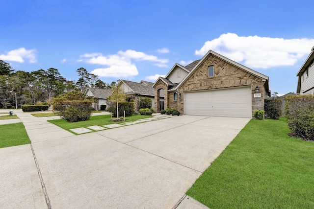 view of front facade featuring a garage and a front yard