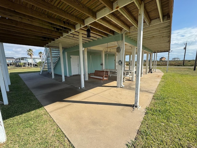 view of patio featuring stairway