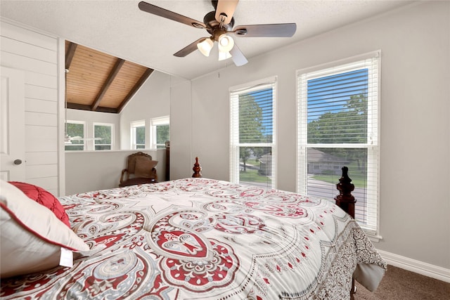 carpeted bedroom with ceiling fan, wood ceiling, and lofted ceiling