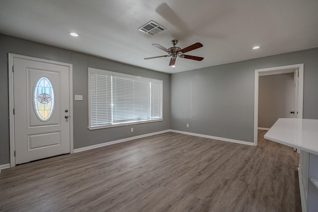 entryway with ceiling fan and light wood-type flooring