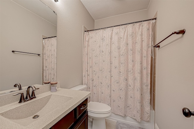 full bathroom with shower / bath combo with shower curtain, vanity, and toilet