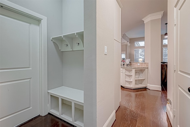 mudroom with dark hardwood / wood-style floors