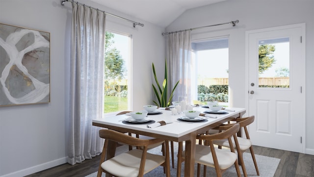 dining area featuring dark hardwood / wood-style flooring and vaulted ceiling