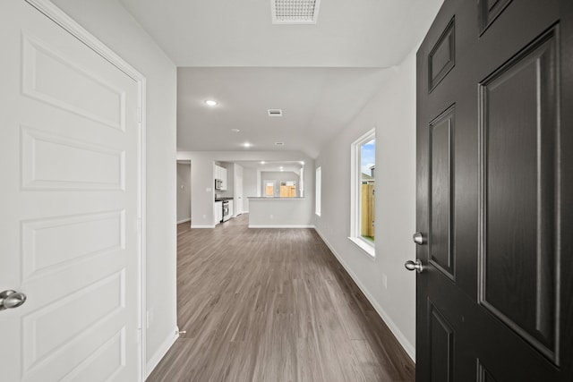 entrance foyer with recessed lighting, dark wood finished floors, visible vents, and baseboards