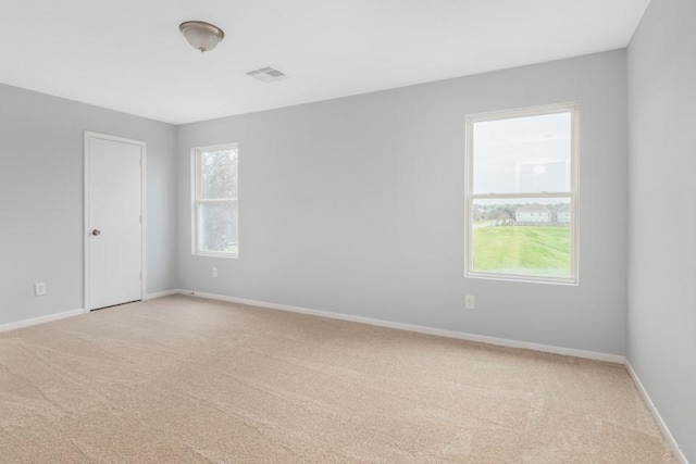 view of carpeted spare room