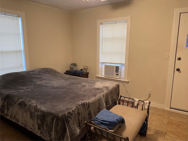 tiled bedroom featuring cooling unit