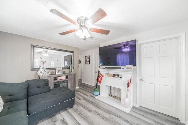 living room with light hardwood / wood-style flooring