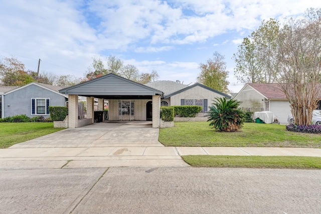 single story home with a front lawn and a carport