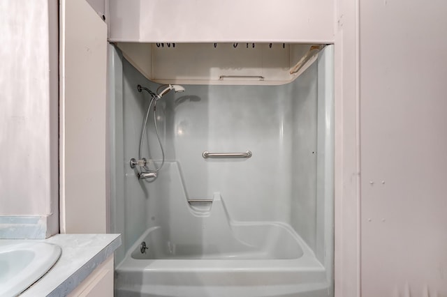 bathroom featuring vanity and shower / washtub combination