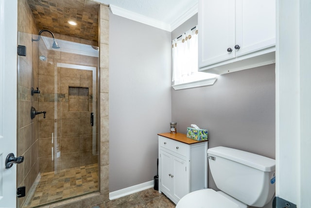 bathroom featuring ornamental molding, a tile shower, and toilet