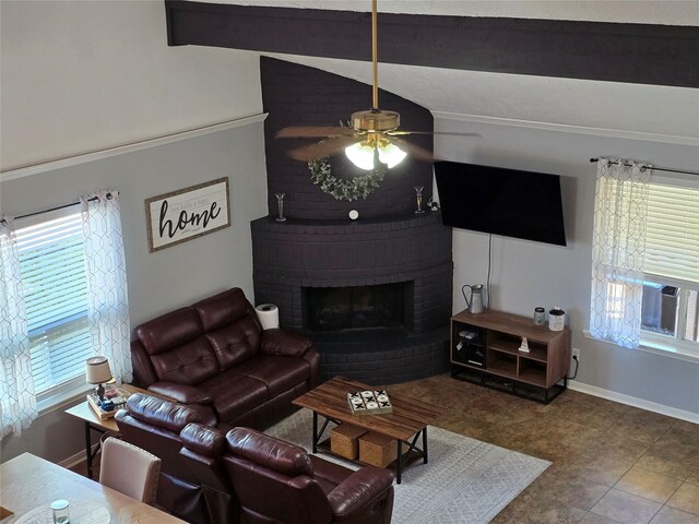 living room featuring vaulted ceiling with beams, a brick fireplace, and ceiling fan