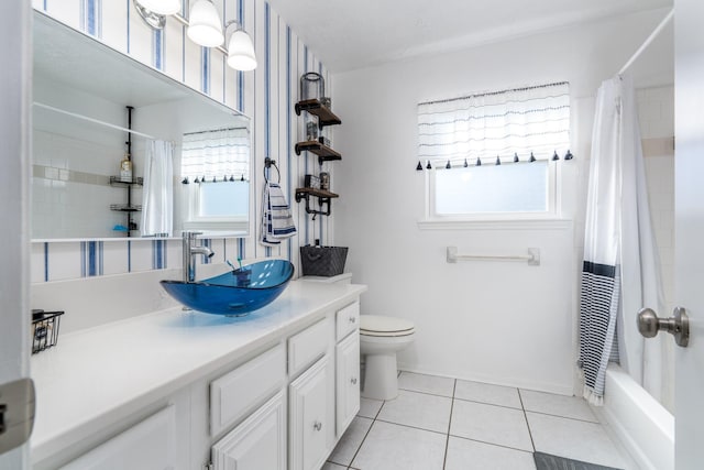 full bathroom with shower / tub combo with curtain, vanity, toilet, and tile patterned flooring