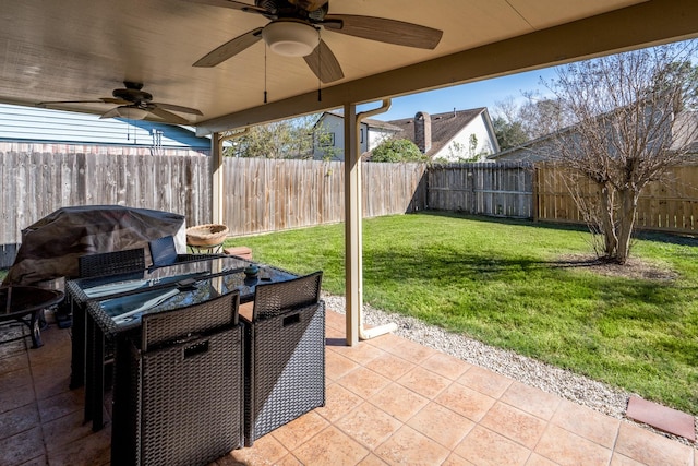 view of patio with ceiling fan