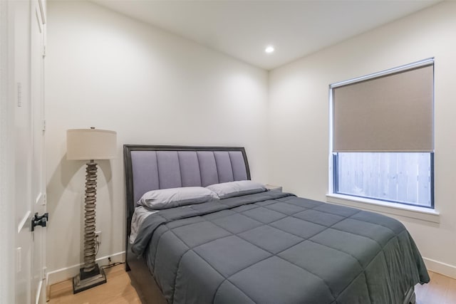 bedroom featuring light hardwood / wood-style floors