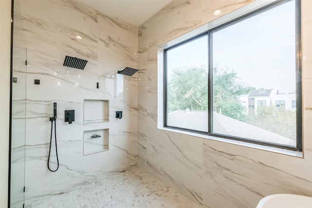 bathroom featuring tiled shower