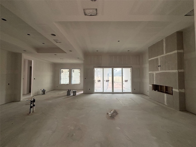 unfurnished living room featuring a fireplace