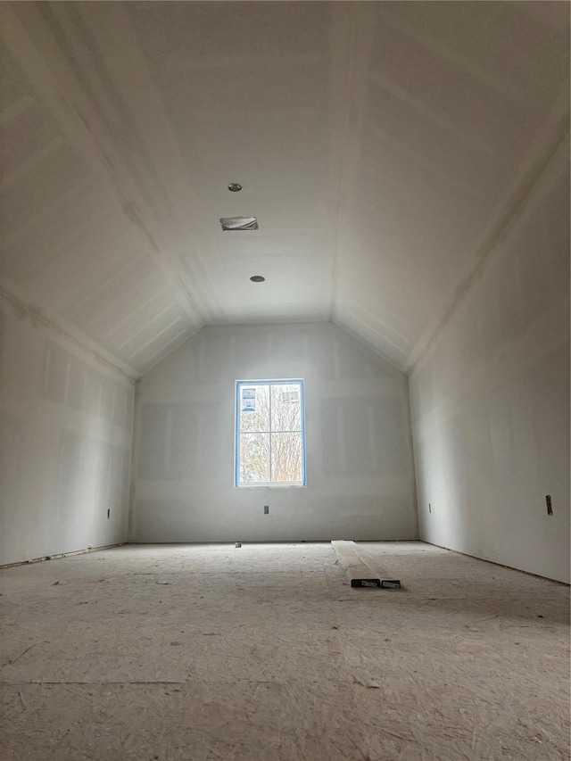 additional living space with lofted ceiling